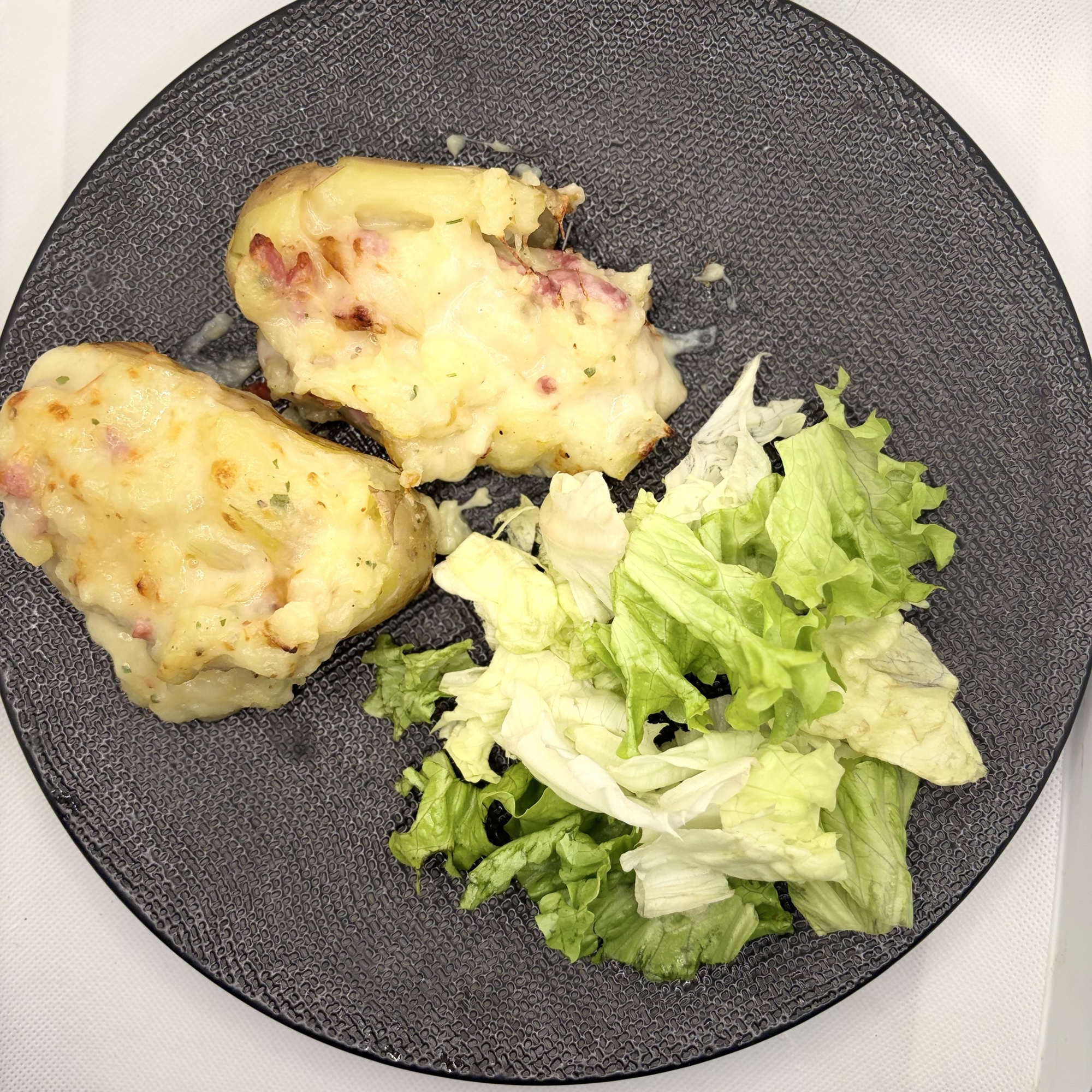 Pommes de terre farcies à la fondue savoyarde (recette anti-gaspillage)